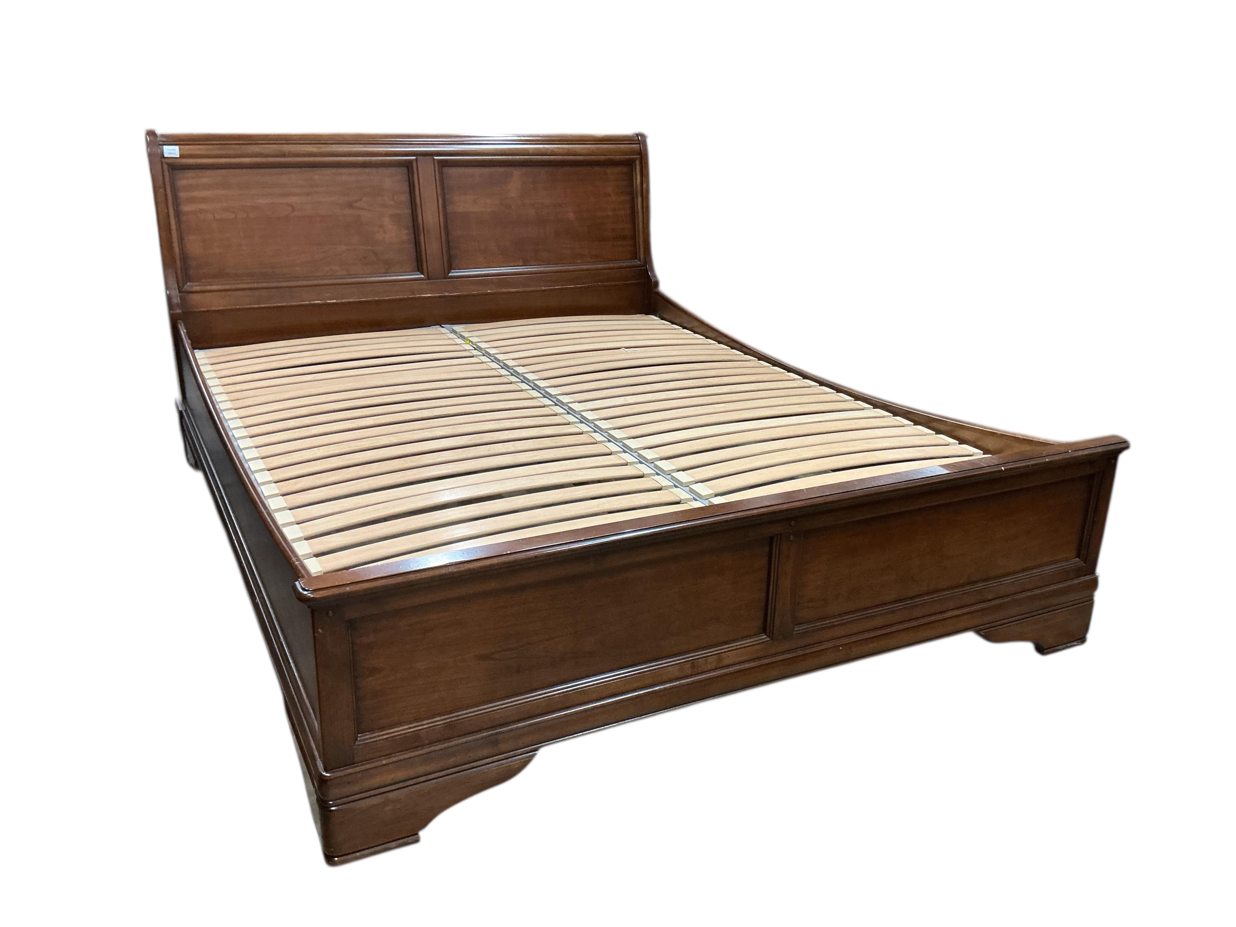 A reproduction mahogany sleigh bed, width 168cm, length 210cm, height 100cm